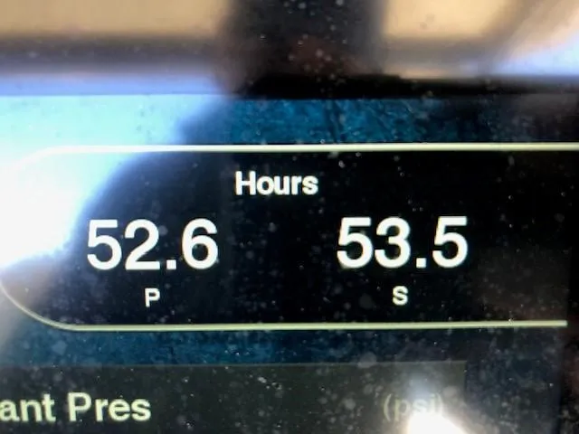 Slide: The Image of Digital display showing engine hours for a 2021 Chris-Craft Catalina 30 boat. - 8