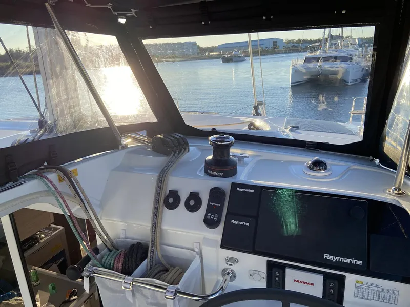 Slide: The Image of Interior view of 2025 Lagoon 40 yacht cockpit with navigation equipment. - 6