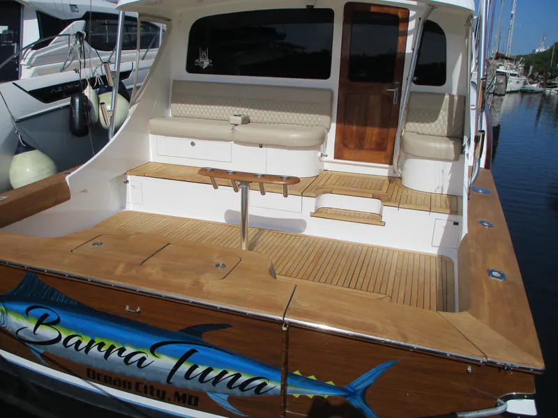 Slide: The Image of 2008 Custom Carolina 53 Sculley boat with wooden deck and seating, docked in Ocean City, MD. - 18