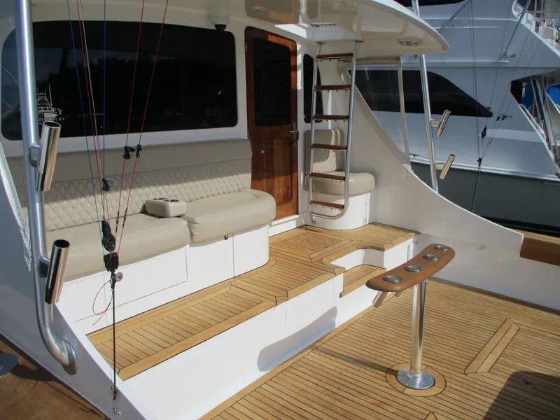 Slide: The Image of 2008 Custom Carolina 53 Sculley yacht with teak deck and cushioned seating. - 19