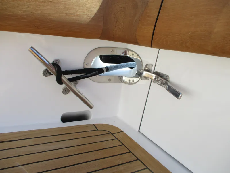 Slide: The Image of Close-up of 2008 Custom Carolina 53 Sculley boat cleat and deck. - 24