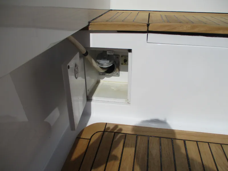 Slide: The Image of Electrical outlet on the deck of a 2008 Custom Carolina 53 Sculley boat. - 33