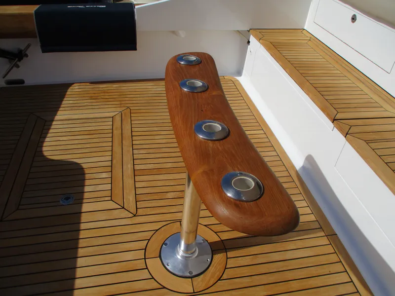 Slide: The Image of Teak deck of 2008 Custom Carolina 53 Sculley with rod holders. - 38
