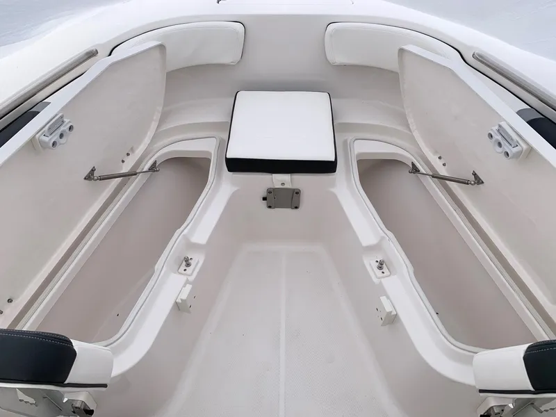 Slide: The Image of 2024 Robalo R200 Center Console boat interior storage compartments. - 5