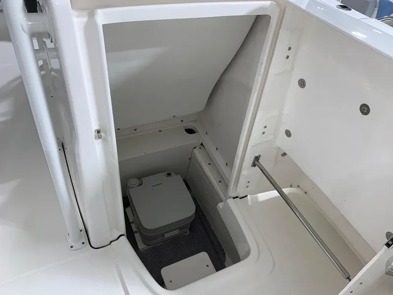 Slide: The Image of 2024 Robalo R200 Center Console boat interior storage compartment. - 7