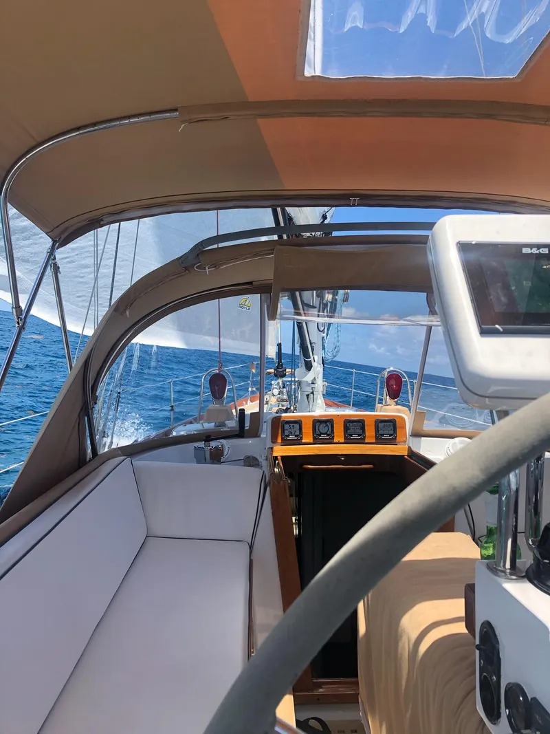 Slide: The Image of 1989 Little Harbor 54 sailboat cockpit with ocean view and navigation equipment. - 14