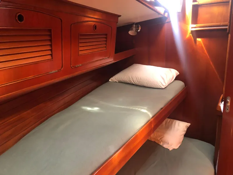 Slide: The Image of Cozy wooden cabin interior of 1989 Little Harbor 54 yacht with bunk beds. - 19