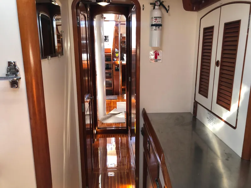 Slide: The Image of Interior of 1989 Little Harbor 54 yacht with polished wood and elegant design. - 21