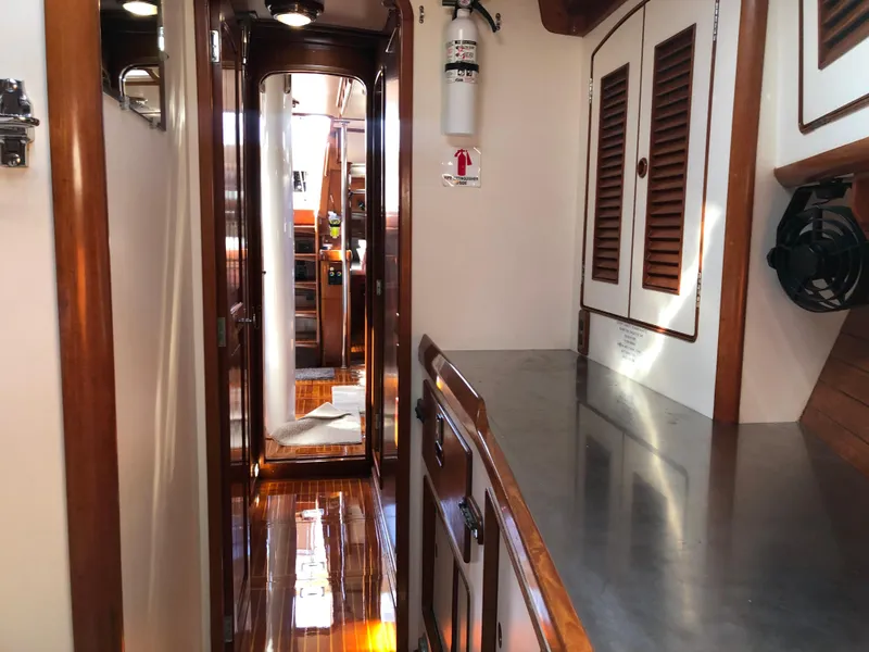 Slide: The Image of Interior of 1989 Little Harbor 54 yacht with polished wood and stainless steel surfaces. - 22