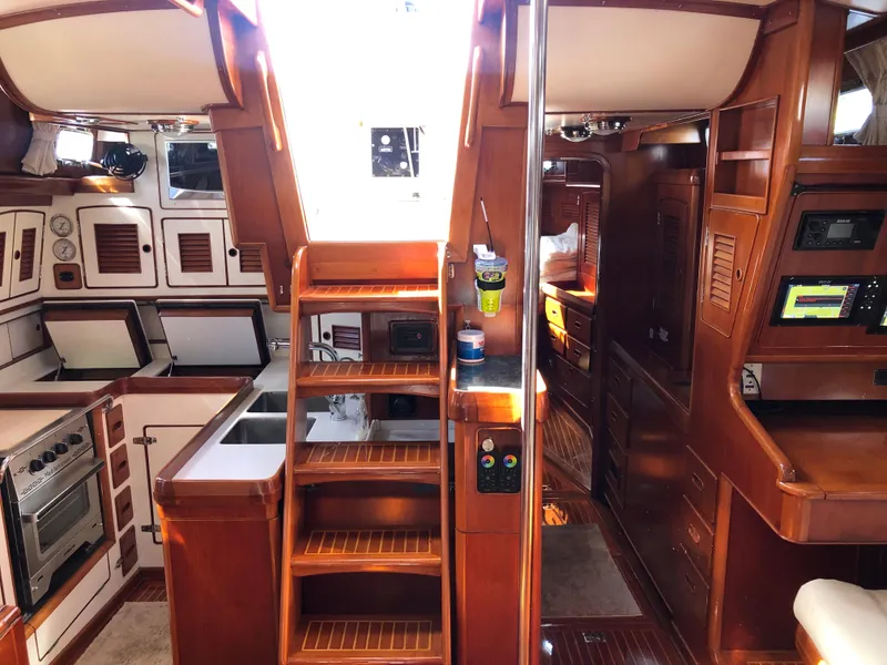 Slide: The Image of Interior of 1989 Little Harbor 54 yacht with wooden cabinetry and modern amenities. - 28