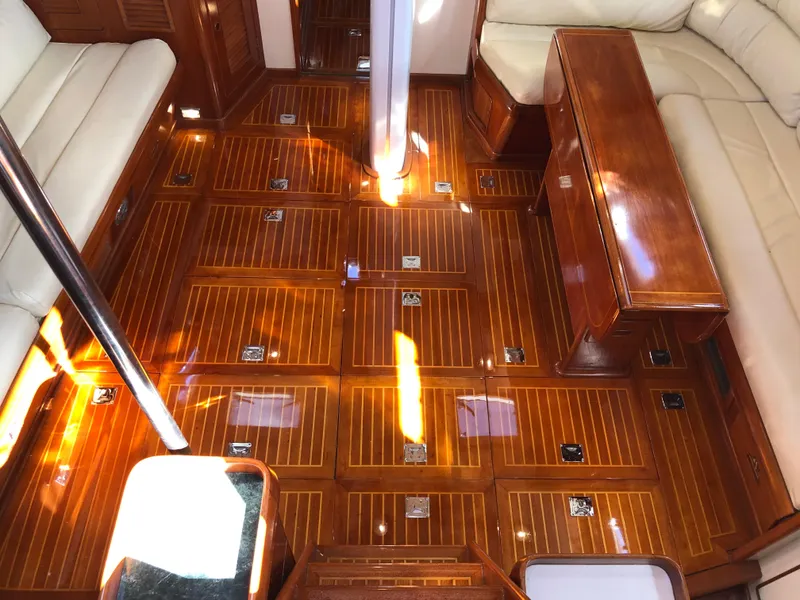 Slide: The Image of Luxurious interior of 1989 Little Harbor 54 yacht with polished wooden flooring. - 32
