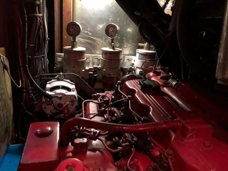 Slide: The Image of Engine room of 1989 Little Harbor 54 yacht with red machinery and gauges. - 37