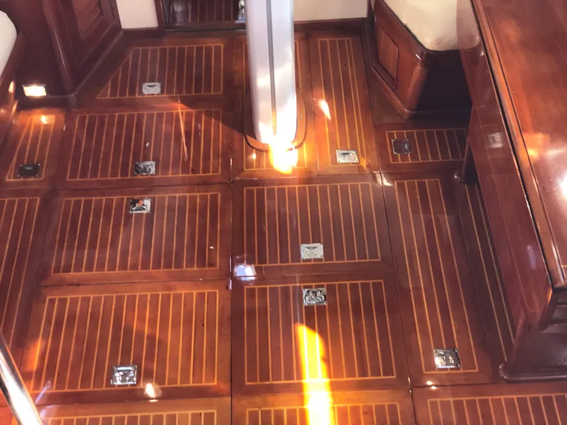 Slide: The Image of Luxurious wooden interior flooring of a 1989 Little Harbor 54 yacht. - 41