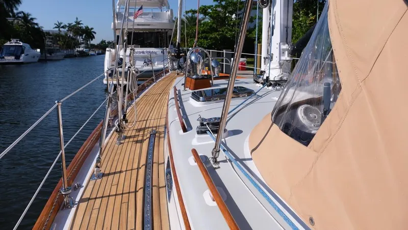 Slide: The Image of 1989 Little Harbor 54 yacht with teak deck, docked on a sunny day. - 47