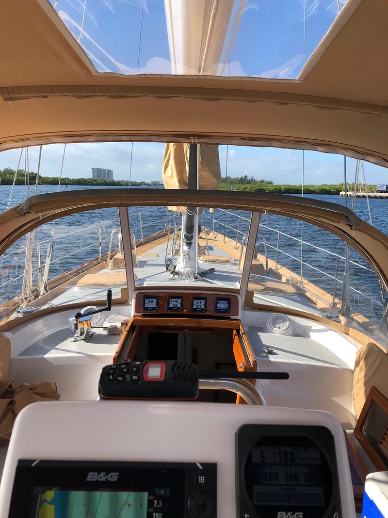 Slide: The Image of 1989 Little Harbor 54 sailboat cockpit with navigation equipment, sailing on a sunny day. - 6