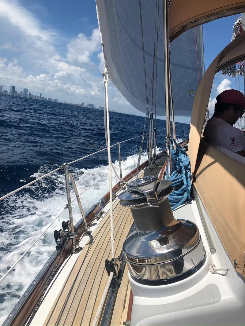 Slide: The Image of Sailing on a 1989 Little Harbor 54 yacht with city skyline in the background. - 9