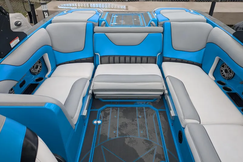 Slide: The Image of Luxurious interior of 2022 MB F22 Alpha boat with blue and gray seating. - 15