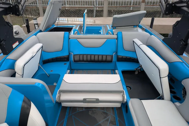Slide: The Image of Interior of 2022 MB F22 Alpha boat with blue and gray seating. - 16