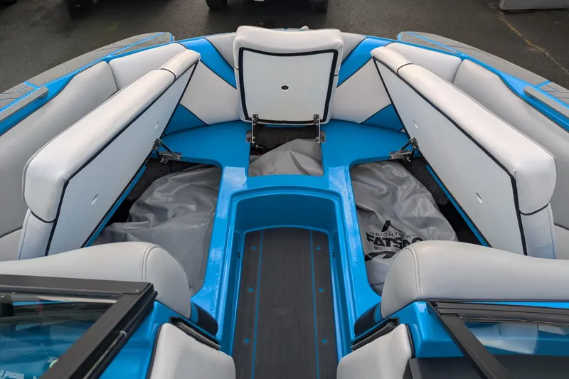 Slide: The Image of Interior of 2022 MB F22 Alpha boat with blue and white seating. - 19