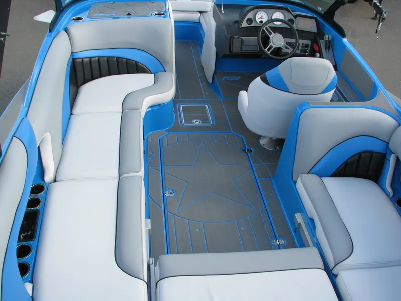 Slide: The Image of 2022 MB F22 Alpha boat dashboard with steering wheel and digital displays. - 6