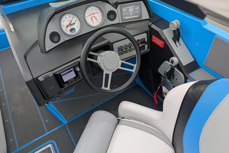Slide: The Image of Cockpit of 2022 MB F22 Alpha boat with modern controls and blue accents. - 7