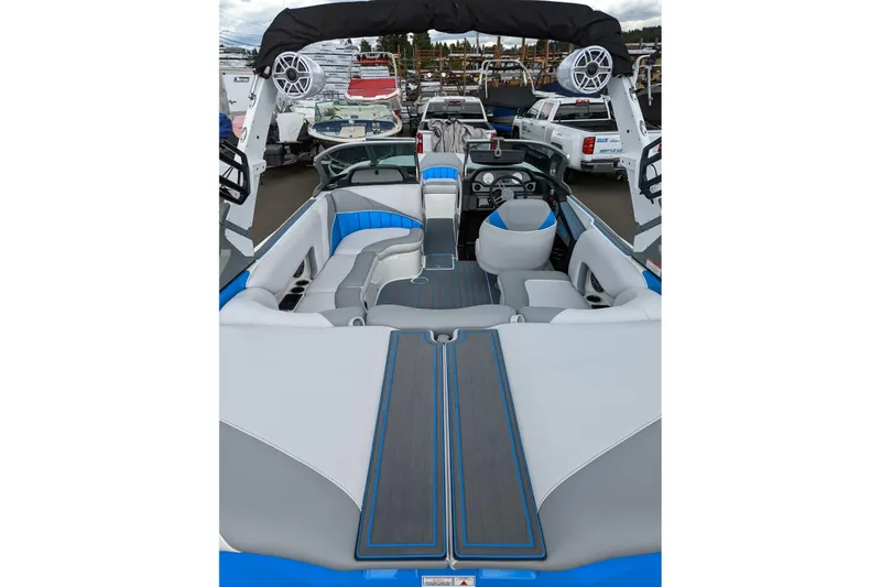 Slide: The Image of 2022 MB B52-21 Classic boat interior with modern seating and audio system. - 13