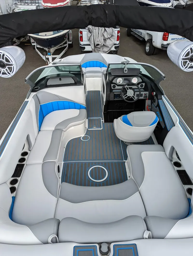 Slide: The Image of 2022 MB B52-21 Classic boat interior with modern seating and dashboard design. - 7