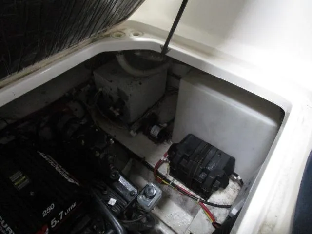 Slide: The Image of Engine compartment of 2002 Bayliner 2655 Ciera Sunbridge, showing mechanical components and wiring. - 18