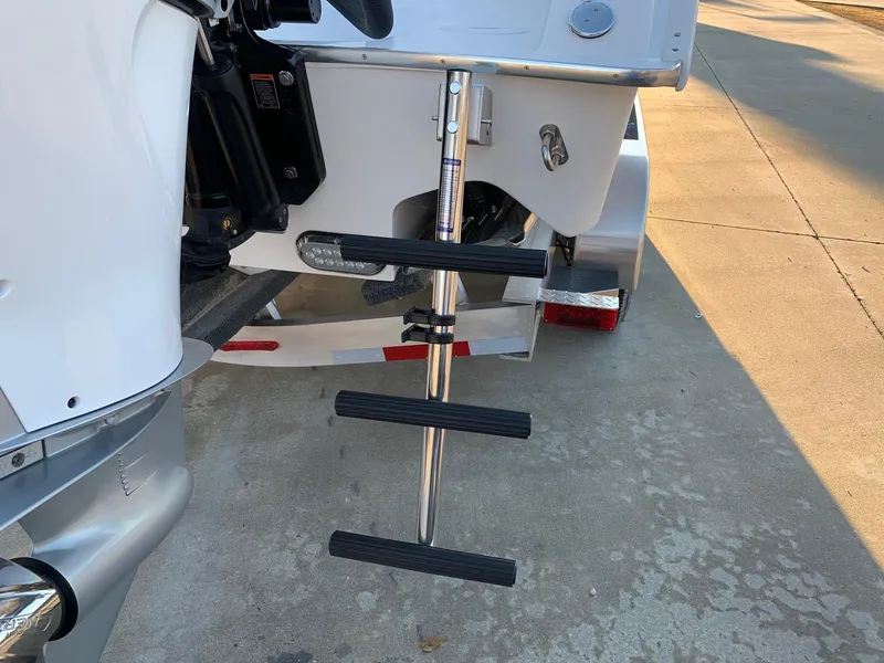 Slide: The Image of 2024 Cape Horn 32T boat with a retractable ladder on a trailer. - 21