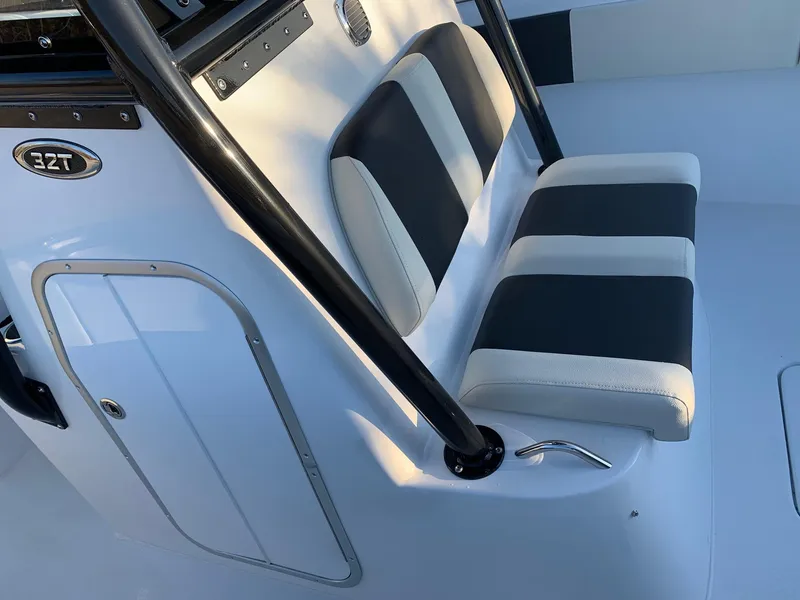 Slide: The Image of 2024 Cape Horn 32T boat interior seating and console detail. - 7