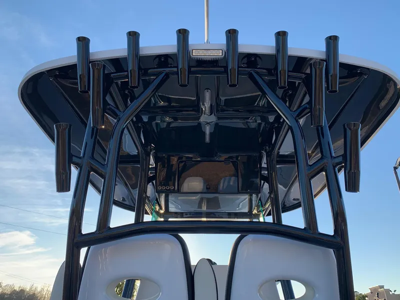 Slide: The Image of 2024 Cape Horn 32T boat with rod holders and T-top. - 3