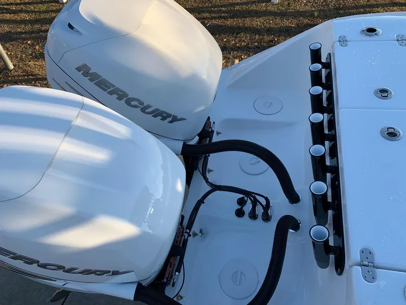 Slide: The Image of 2024 Cape Horn 32T boat with twin Mercury outboard engines. - 18