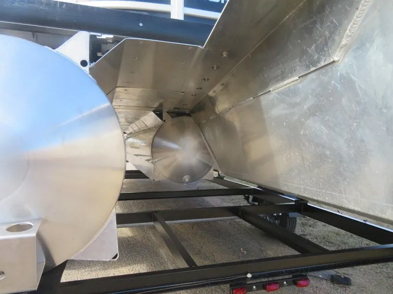 Slide: The Image of 2022 Coach Pontoons 241 RFC underside view showing aluminum pontoons and trailer. - 21