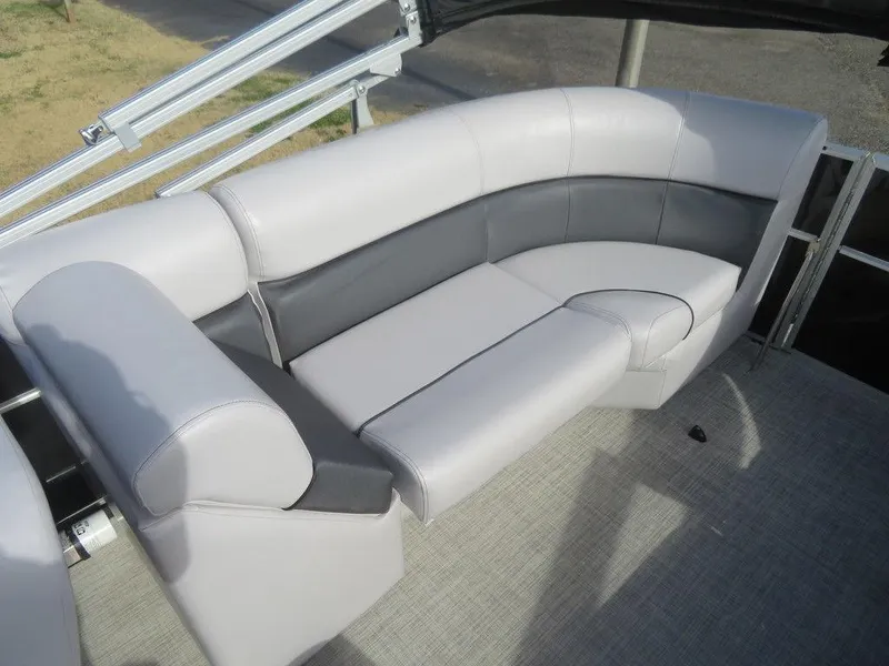 Slide: The Image of 2022 Coach Pontoons 241 RFC interior seating area with gray and white upholstery. - 24