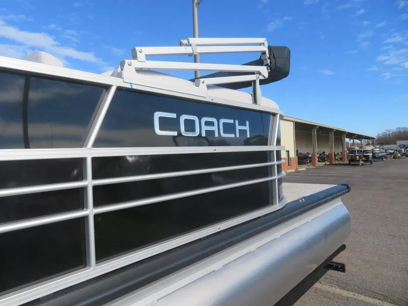 Slide: The Image of 2022 Coach Pontoons 241 RFC pontoon boat side view. - 25