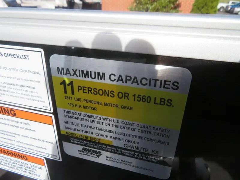 Slide: The Image of 2022 Coach Pontoons 241 RFC maximum capacity label: 11 persons or 1560 lbs. - 27