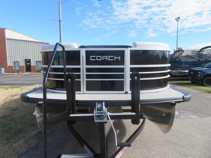 Slide: The Image of 2022 Coach Pontoons 241 RFC pontoon boat on trailer, front view. - 28