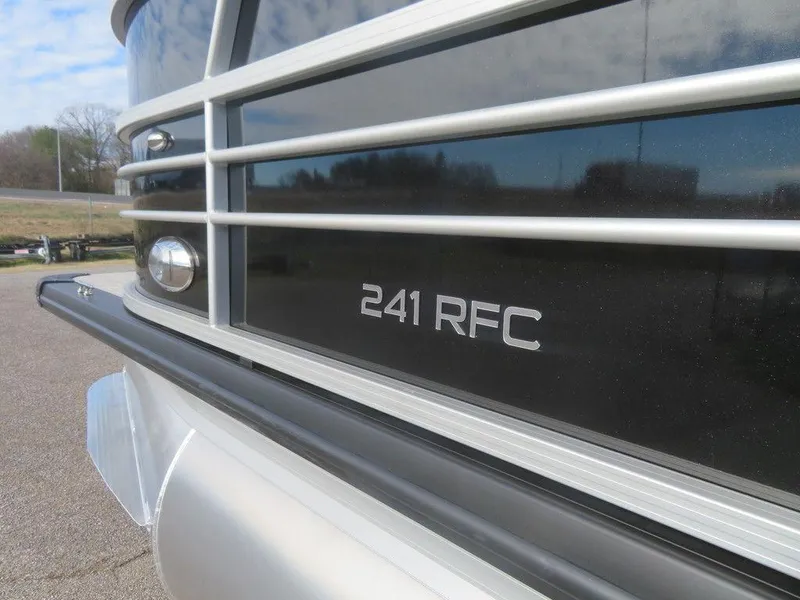 Slide: The Image of 2022 Coach Pontoons 241 RFC close-up, sleek design and branding. - 7