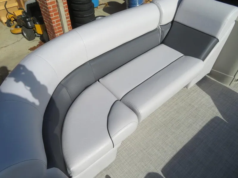 Slide: The Image of 2022 Coach Pontoons 241 RFC boat with gray and white cushioned seating. - 16