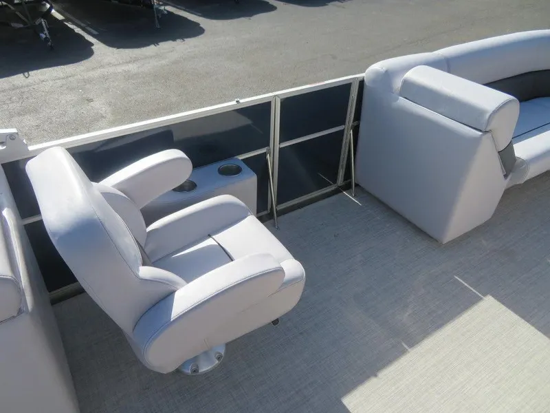 Slide: The Image of 2022 Coach Pontoons 241 RFC interior seating with cup holders. - 17