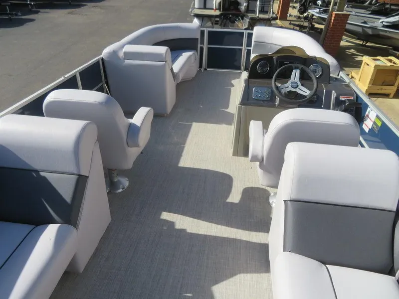 Slide: The Image of 2022 Coach Pontoons 241 RFC interior with spacious seating and modern helm. - 18