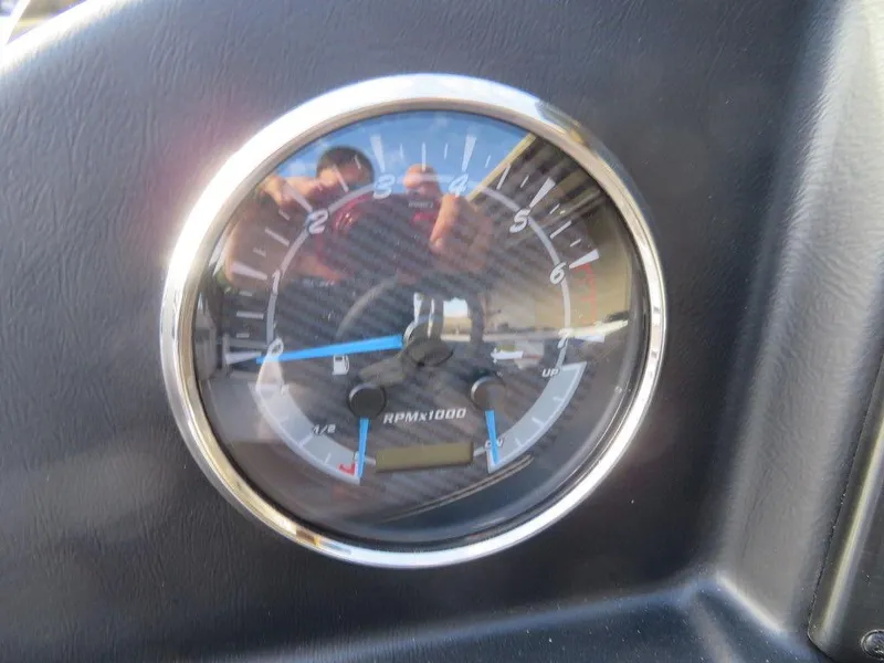 Slide: The Image of Close-up of 2022 Coach Pontoons 241 RFC tachometer gauge. - 19