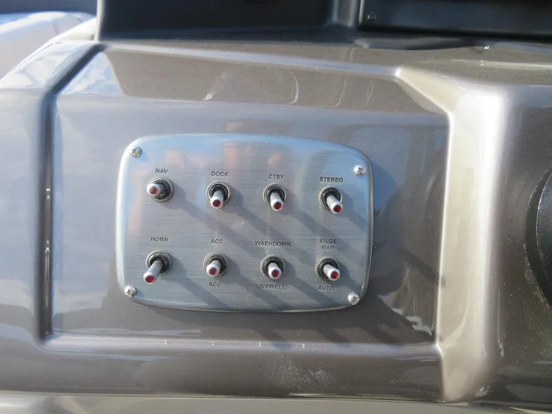 Slide: The Image of Control panel of a 2022 Coach Pontoons 241 RFC boat. - 21