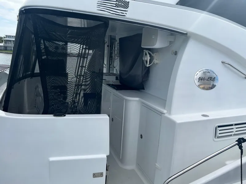 Slide: The Image of Jutson 46 LRC yacht, 2000 model, featuring a sleek cockpit design. - 11