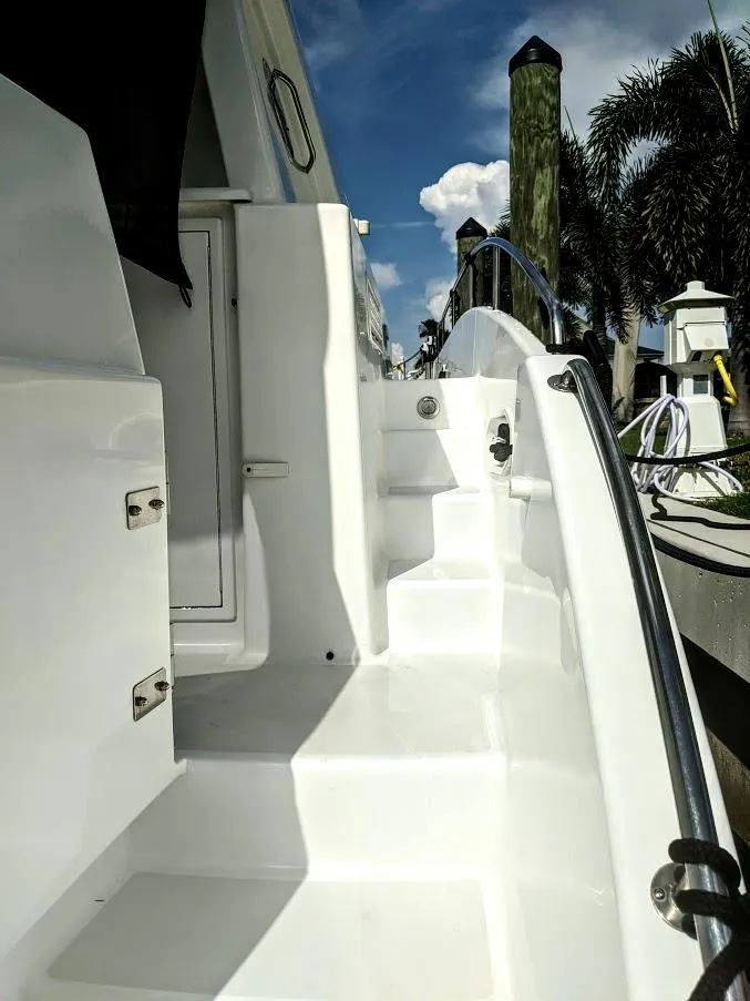 Slide: The Image of Jutson 46 LRC 2000 yacht, white steps and railing, sunny day. - 18