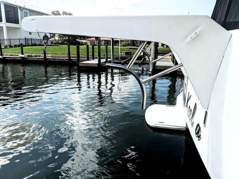 Slide: The Image of Jutson 46 LRC 2000 at dock with water reflections. - 21