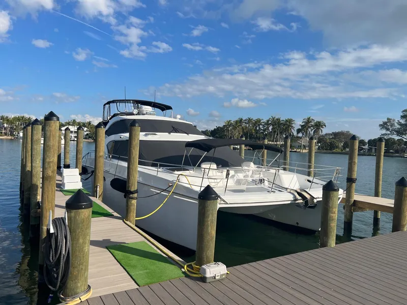 Slide: The Image of Jutson 46 LRC yacht from 2000 docked on a sunny day. - 3