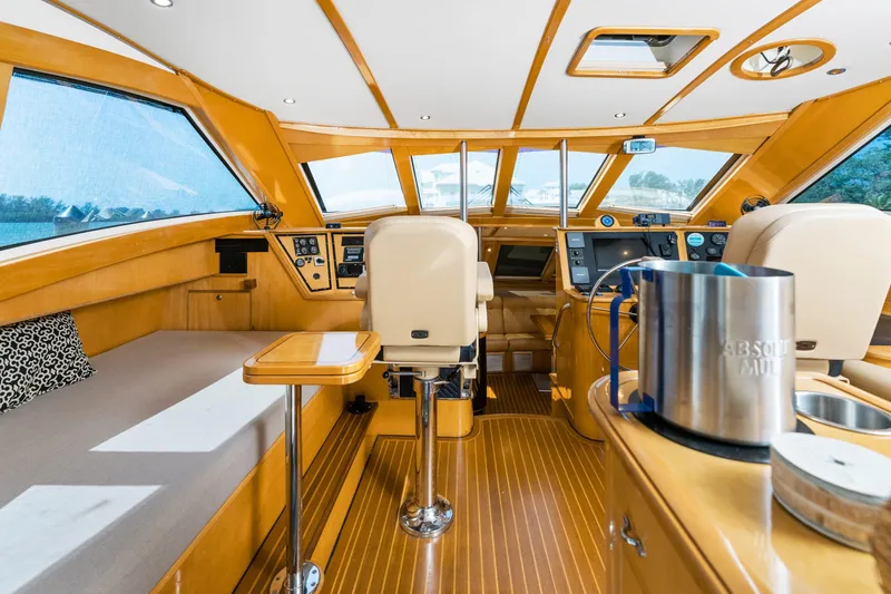 Slide: The Image of Luxurious interior of 2000 Jutson 46 LRC yacht with modern helm and seating. - 35