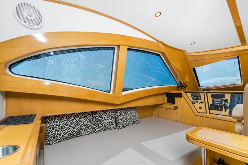 Slide: The Image of Interior of 2000 Jutson 46 LRC yacht with modern helm and large windows. - 40