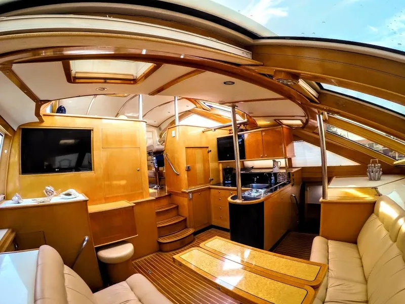 Slide: The Image of Interior of 2000 Jutson 46 LRC yacht with luxurious wood finish. - 42